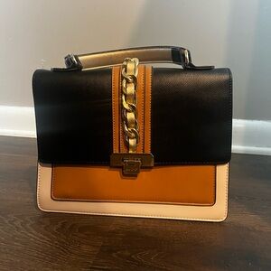 Aldo Black and Tan Satchel with Gold Chain detail